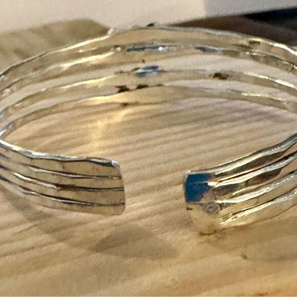 Sleek Silver Charm Bracelet with Intricate Detailing - Picture 1 of 4